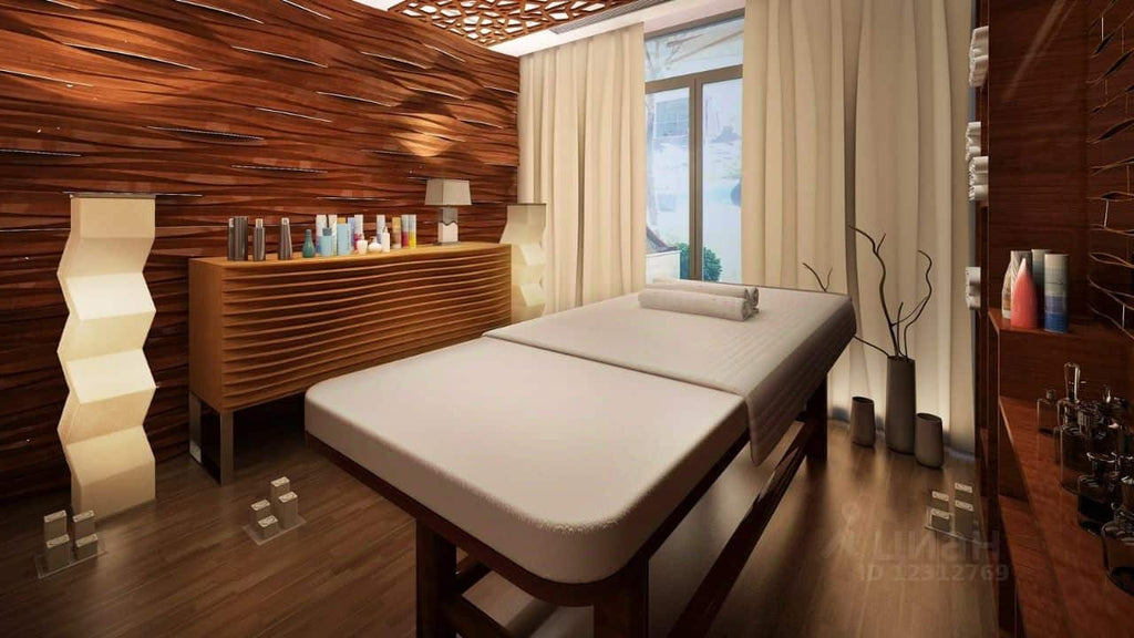 How much room is needed around a massage table?